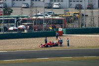 Michael Schumacher spint tijdens de Chinese GP 2005